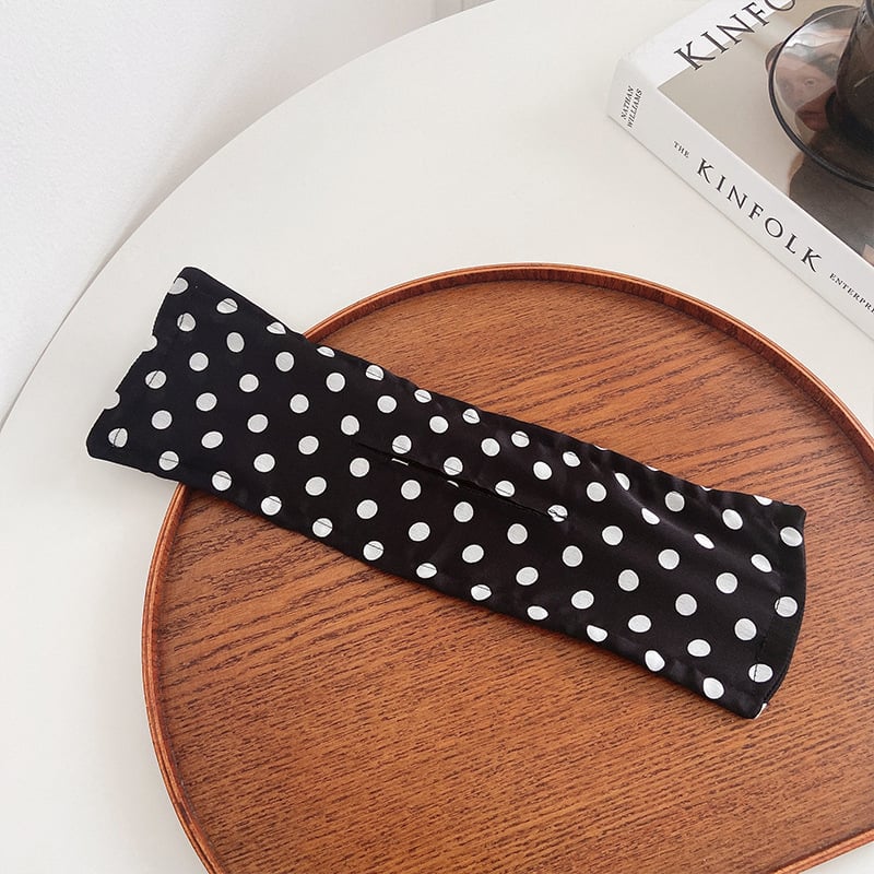 Black polka dots