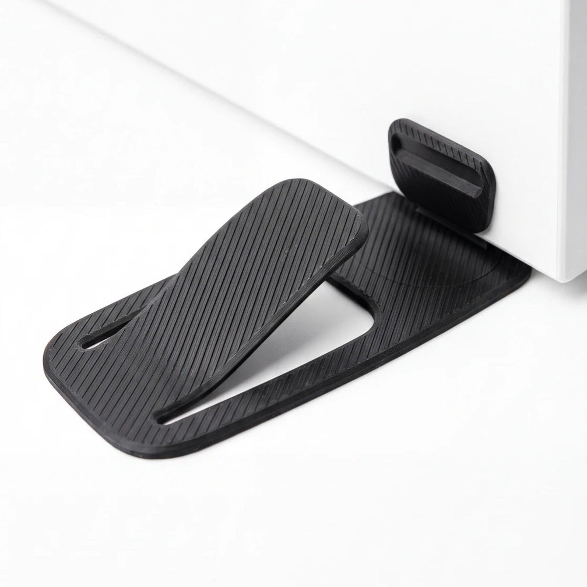 Flexible door stopper—a rental essential; no installation required, suitable for various settings.
